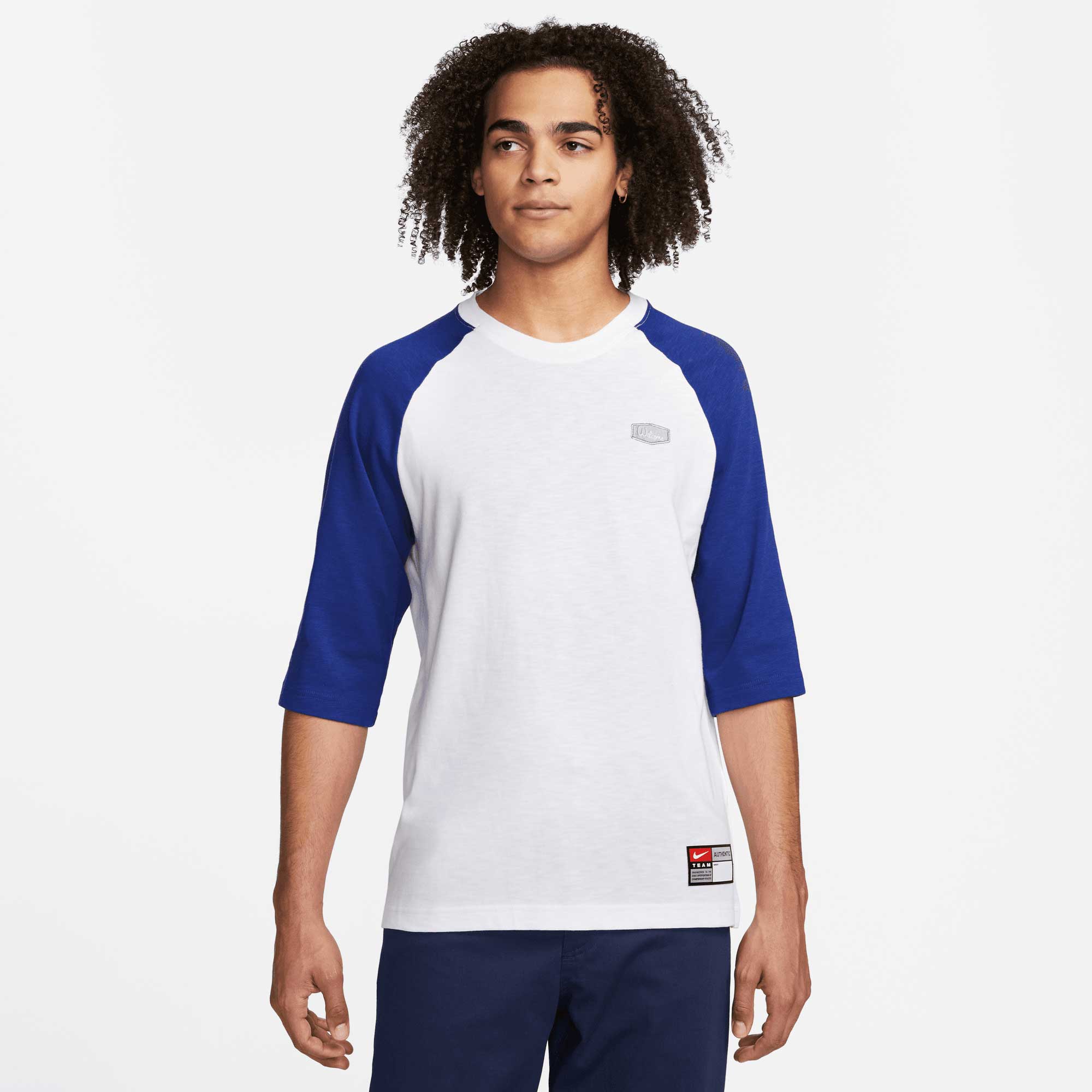 White and royal store blue nike shirt